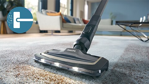 Philips AquaTrio Cordless 9000 Series​dammsugare och mopp rengör en heltäckningsmatta och en matta