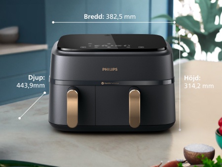 Philips Airfryer med dubbla korgar som st&aring;r p&aring; k&ouml;ksb&auml;nken med alla m&aring;tt beskrivna: bredd: 38,25&nbsp;cm, djup: 31,42&nbsp;cm, h&ouml;jd: 44,39&nbsp;cm